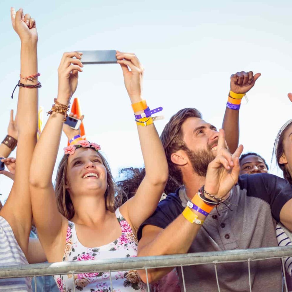 People enjoying concert using Where To Enjoy employee and member benefits